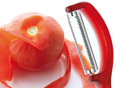 Pelador tomates rojo